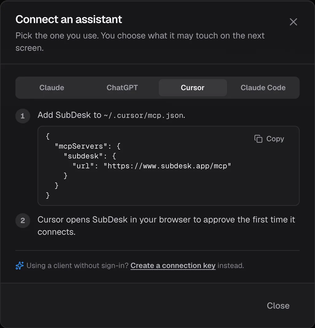 The Connect an assistant dialog on the Cursor tab, with the JSON for mcp.json